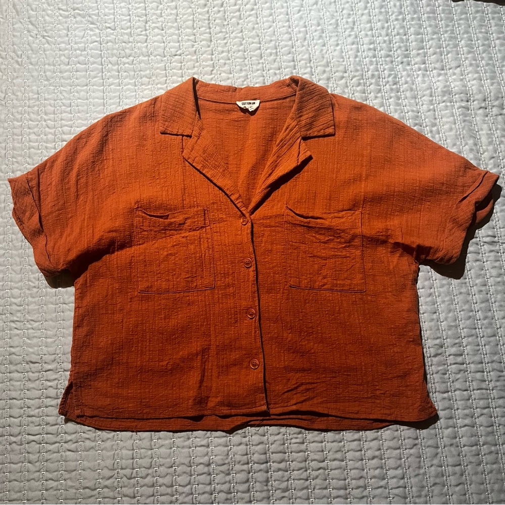 Oversized orange vacation button-up top